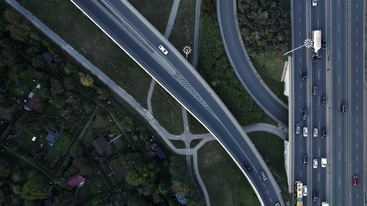 Road leading to S8 highway in Warsaw with forming jam, aerial top down view