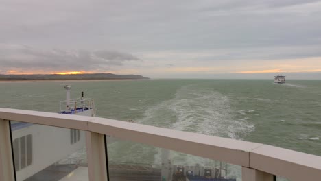 view from the stern of a ferry boat crossing the waters of the english channel