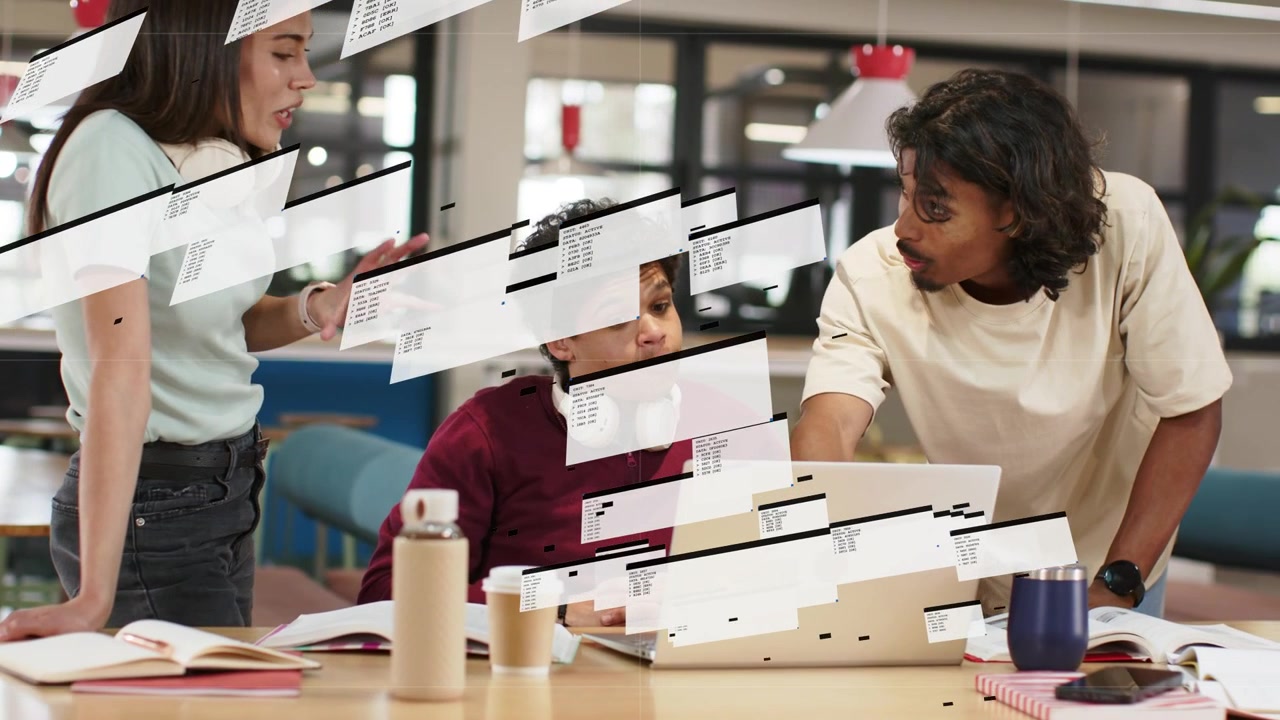 Team of three reviewing code on laptop in tech hub, left member initiating overlays obscuring faces