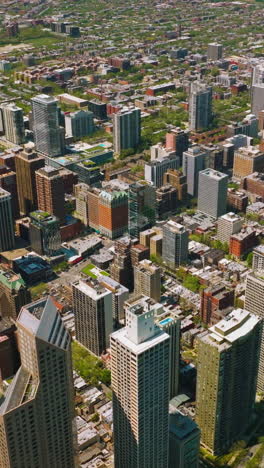 unbelievable picture of beautiful chicago city, illinois, usa. modern diverse architecture of urban city from aerial perspective. vertical video