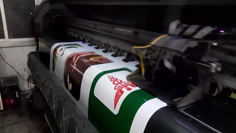 large format banner printing machine in operation. industry