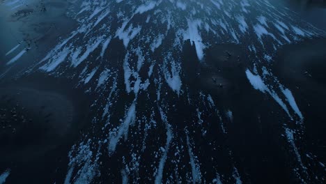 super cold frozen lake in evening sunset blue light