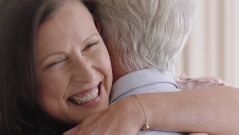 happy old couple hugging enjoying romantic relationship sharing connection embracing at home