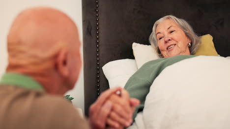 care, sick and senior couple in bed holding hands