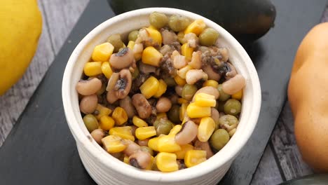 bowl of bean, corn, and pea salad