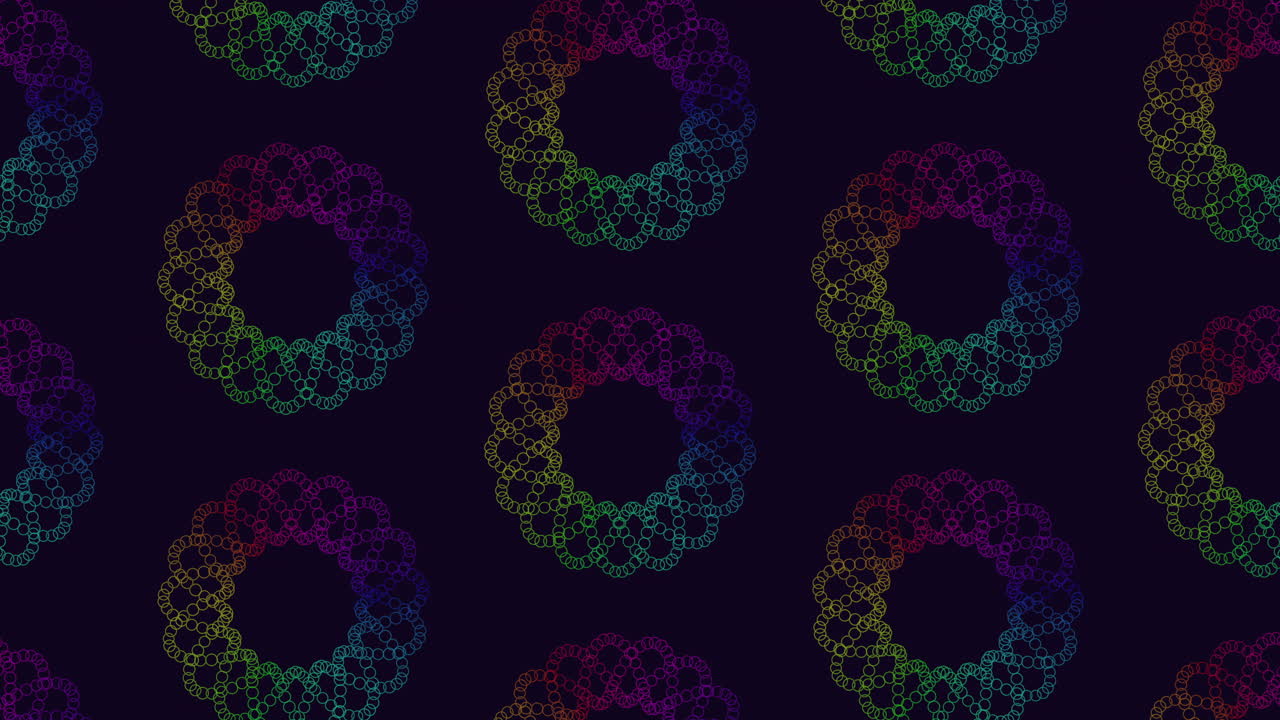 Vibrant spiral pattern rainbow-colored circles on black