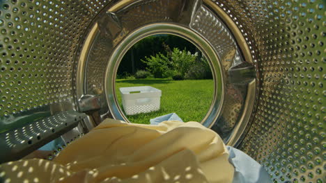 laundry machine with view of garden