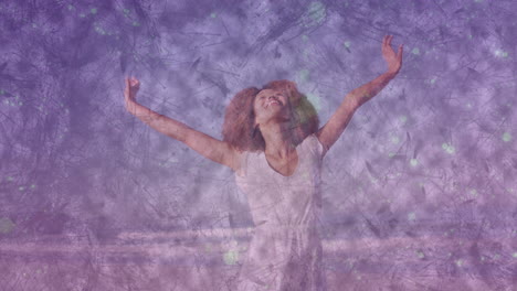 woman raising arms against purple tech backdrop showing animated scratch textures and green bokeh