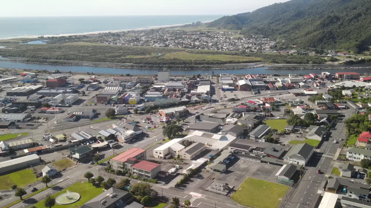 Drone flyover commercial and public area in small town Greymouth, New Zealand