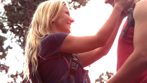 Couple-celebrating-the-end-of-their-hike