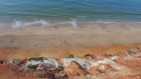 topdown view of falesia beach, stunning cliffs and turquoise water, algarve