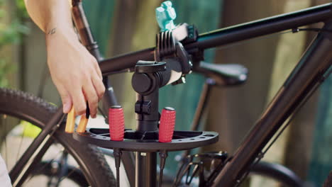 person choosing tools for bicycle repair