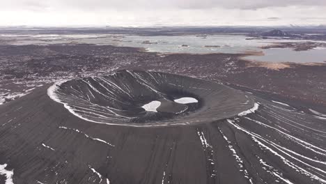 stunning aerial drone view of hverfjall tephra crater and its vast volcanic landscape near lake mývatn, iceland.