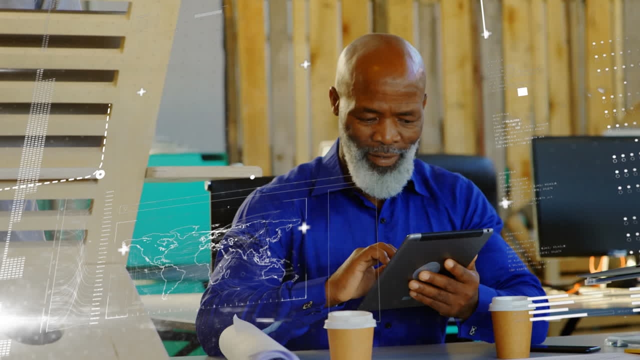 Animation of graphs, bars, computer language, african american man using digital tablet in office