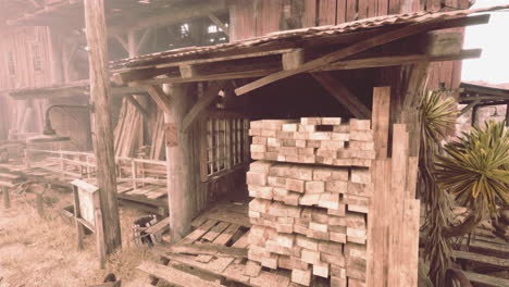 old wooden mill in a foggy desert