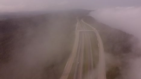 clouds and fogs over interstate 75 and rarity mountain road in newcomb, tennessee, usa