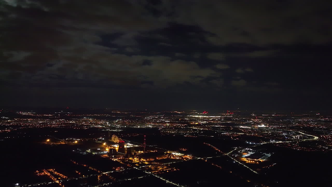 Night City Aerial View with Power Plant