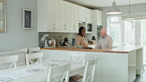 two people in a kitchen
