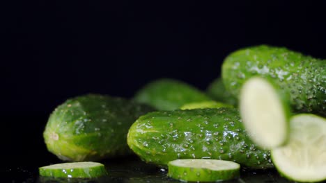 round slices of cucumber falling on the table.
