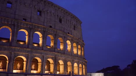 camera shot of colosseum at dusk in rome