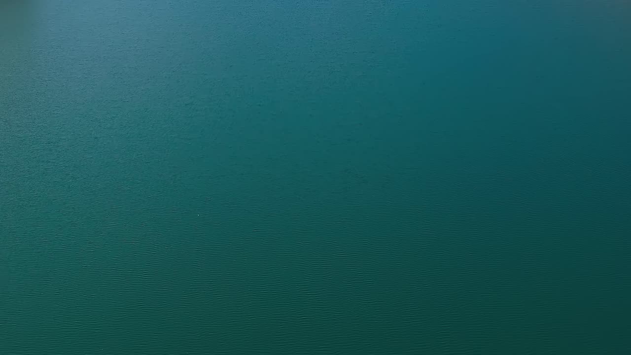 View of calm waters at sunset in Granada, Spain