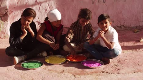 kids celebrating the hindu festival of holi in rajasthan, india