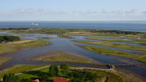 Aerial-wide-shot-of-the-Waterdunes---a-nature-area-and-recreational-park-in-the-province-of-Zeeland,-The-Netherlands