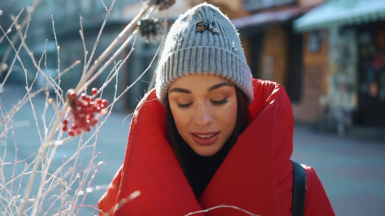 Woman in Red Winter Coat and Beanie