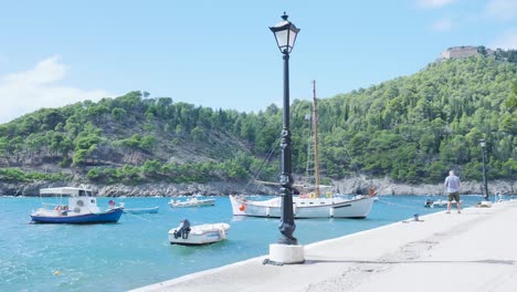 greek coastal harbor with boats