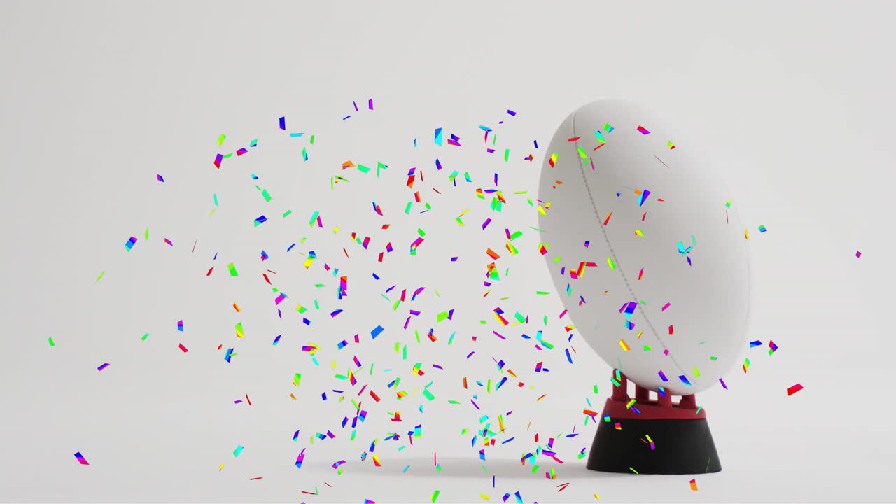 색 바탕에 색 럭비 공 위에 있는 콘페티의 애니메이션