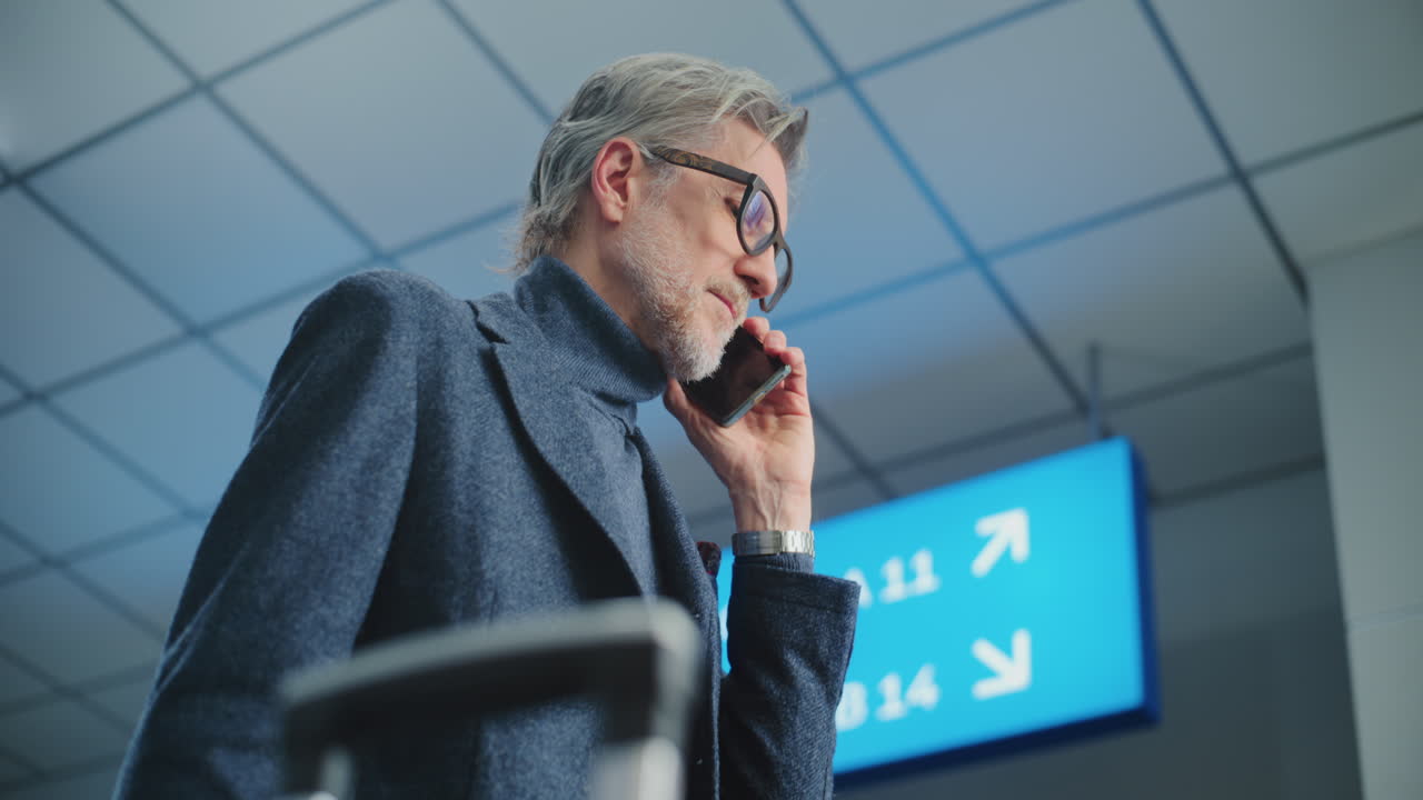 Man Waiting in Airport Terminal