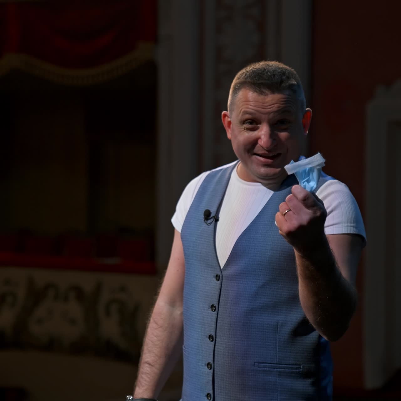 Man performs on stage during pandemic