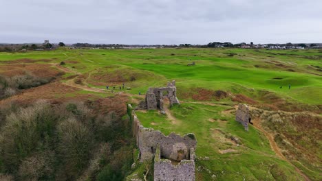 the remnants of penrice castle near penmaen village overlooking three cliffs bay