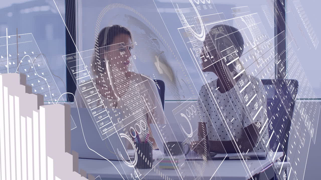 In office, businesswomen discussing animation of digital financial data on screen