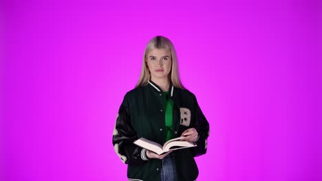 confused young female student doesn't understand education book, frustrated