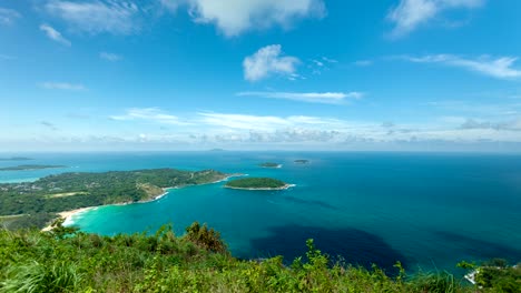 timelapse of small island in tropical andaman sea,beautiful tropical island in phuket. thailand under a clear blue sunny sky in summer season