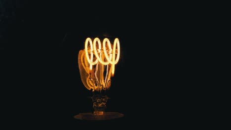 LED-filament-light-bulb-switching-off