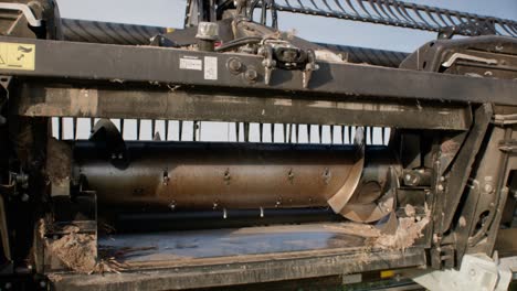 Detail of combine harvester platform auger on trailer