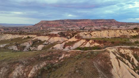 aerial view of cappadocia's unique landscape at sunset, calm and vast