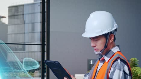 vista lateral cercana de un ingeniero masculino asiático con casco de seguridad trabajando en una tableta mientras está de pie con el concepto de vehículo eléctrico, instalación industrial de alta tecnología