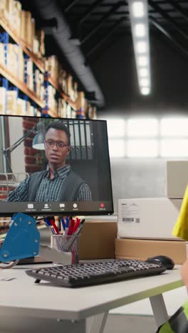vertical video asian call center clerk answering a video call with a customer