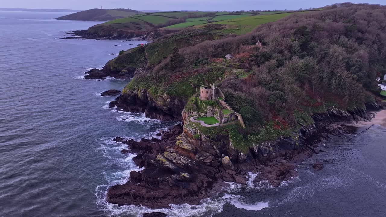 Circling the remains of St Catherine's castle on a rocky outcrop on the river Fowey