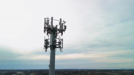 aerial shot rotating around cell phone tower. 4k drone footage