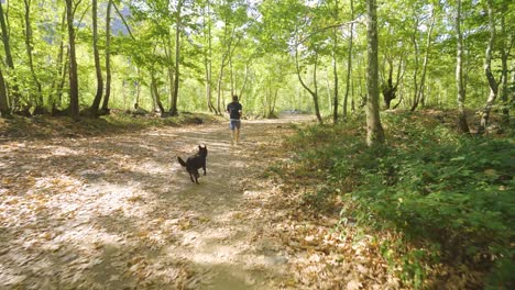 man man running with dog.