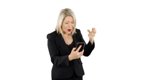 attractive blonde business woman angry and updet as she loses money on a game app on her phone with white background