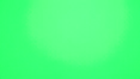 mano masculina haciendo forma de corazón en pantalla verde chromakey