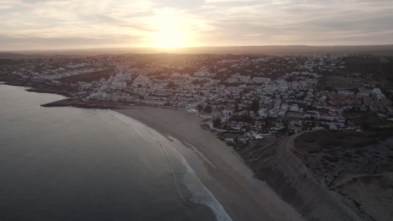 Sunset wide aerial view of Praia da Luz beach, Algarve, Portugal. Holidays destination