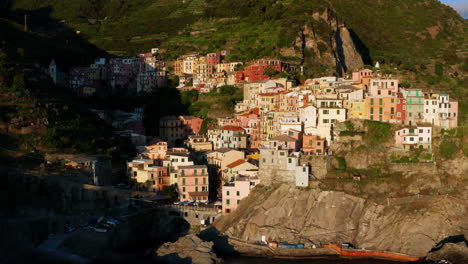 aerial view of manarola, forward push shot of italy at sunset