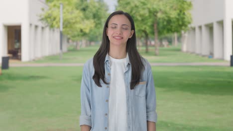 happy indian girl relaxes and takes long breaths