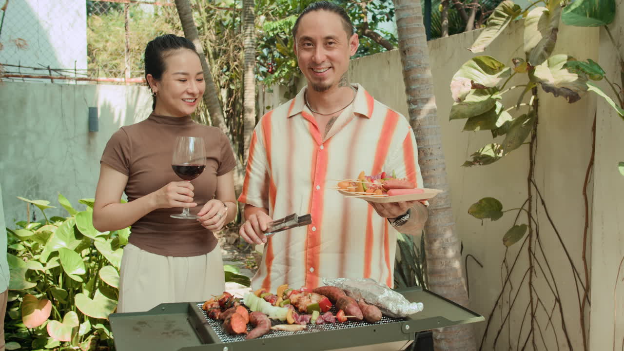 Portrait of Couple Smiling during Barbecue Party